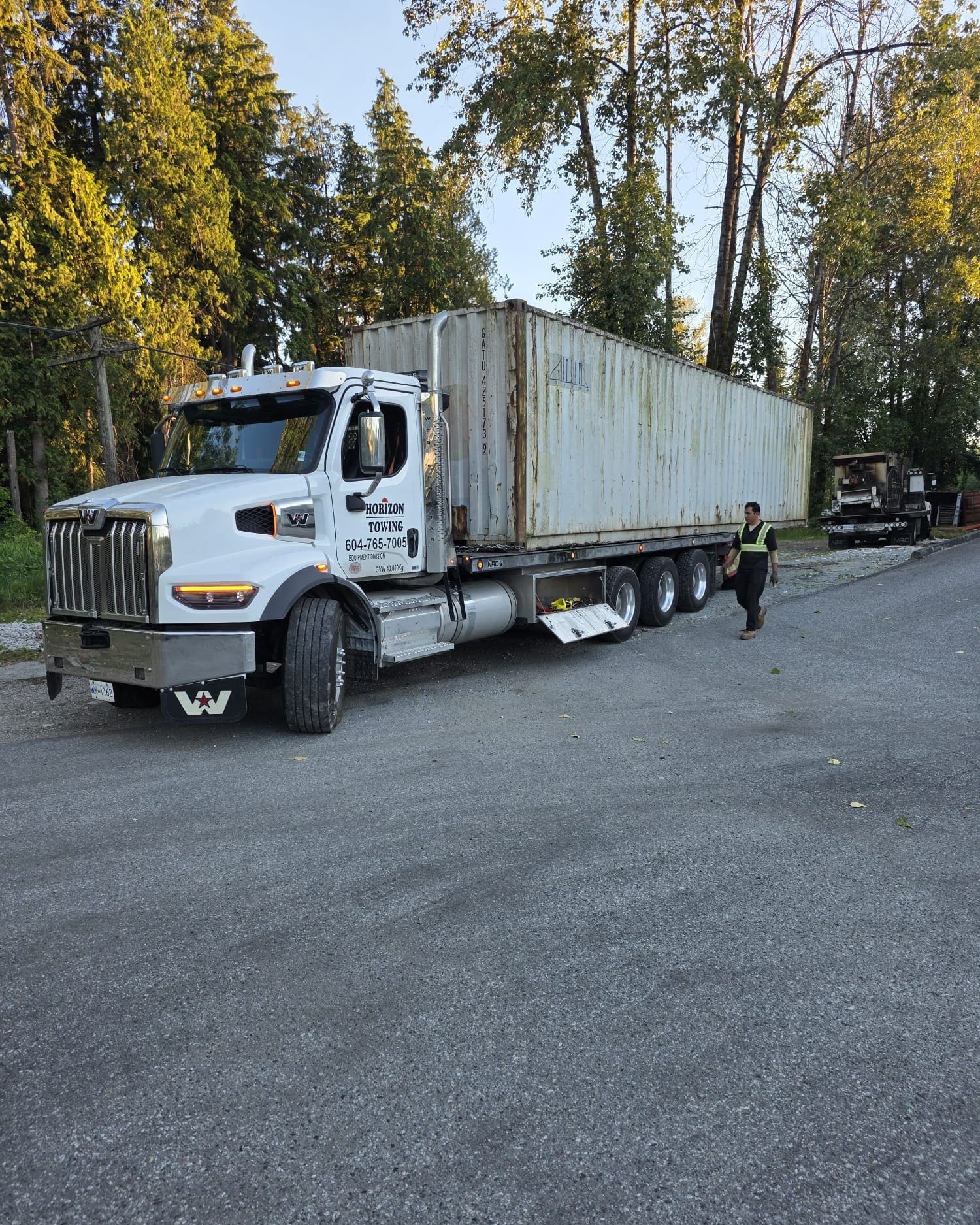 40 ft shipping container being removed