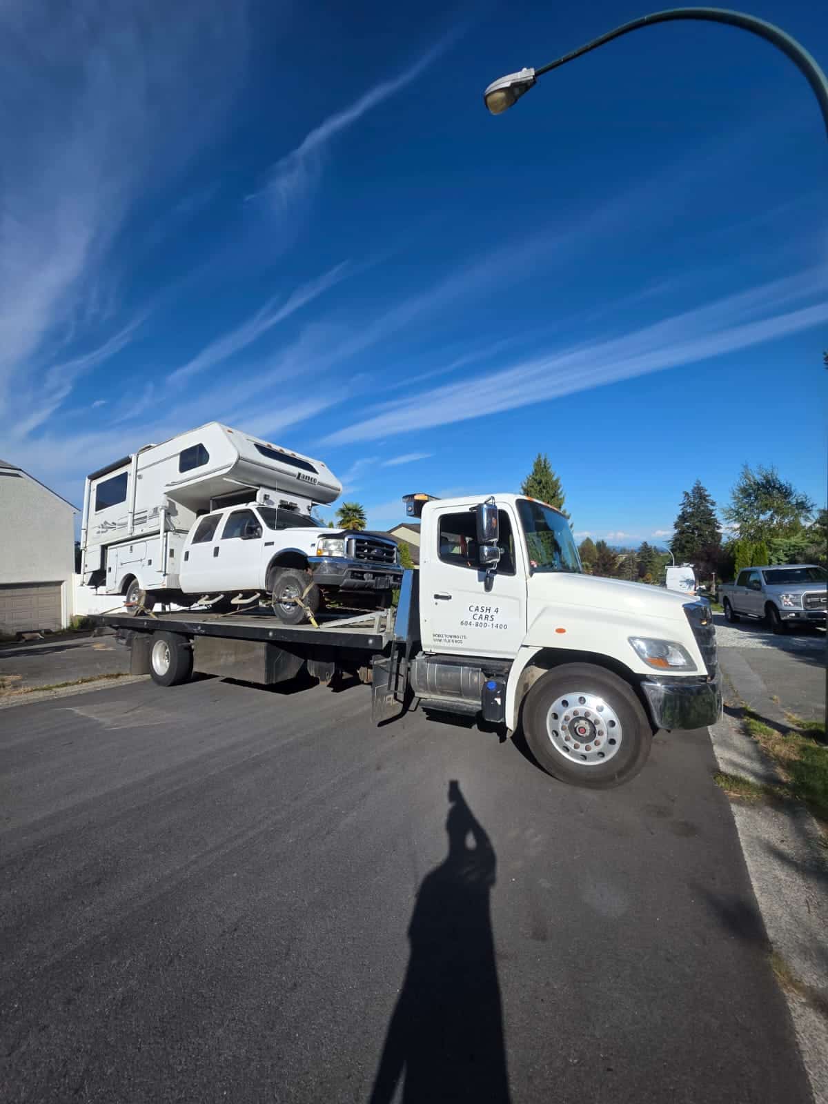 Old vehicle being removed by Noble Towing